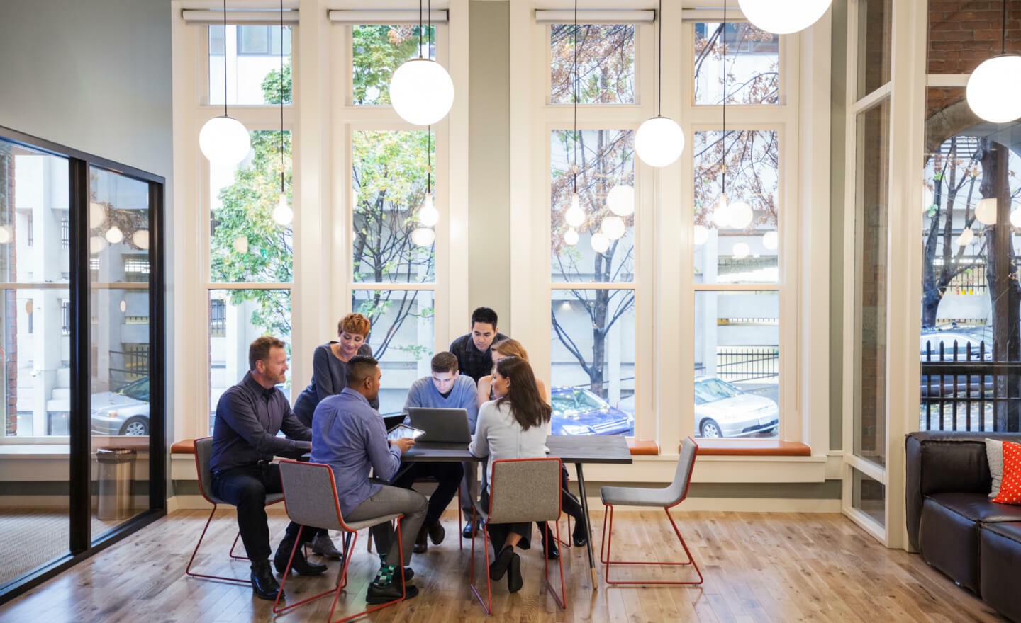 Diverse group working in light office 720x440