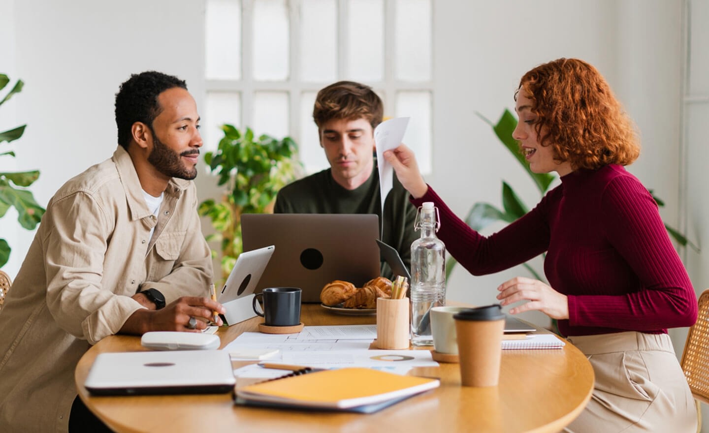 Hiring team brainstorm in office