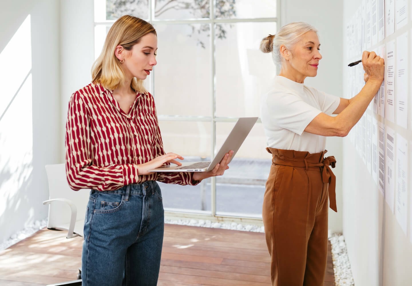 Image of women collaborating together in office