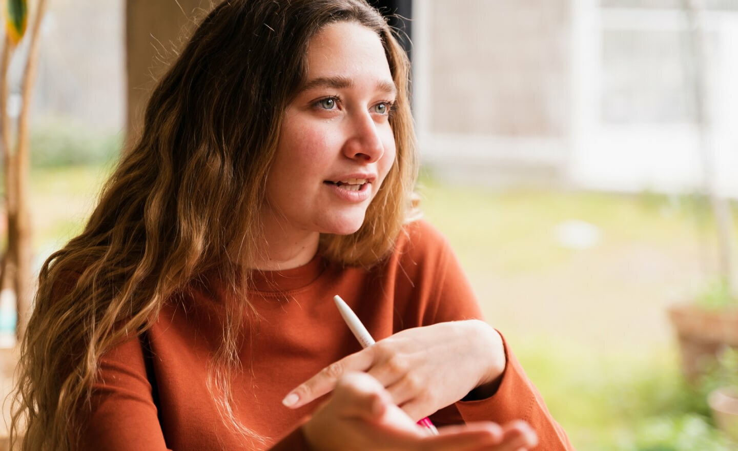 Portrait of hiring leader talking in a meeting