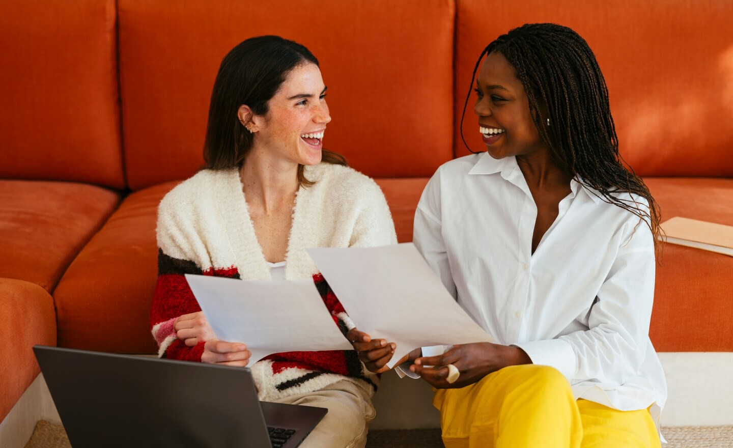 Recruiter and hiring manager reviewing resumes