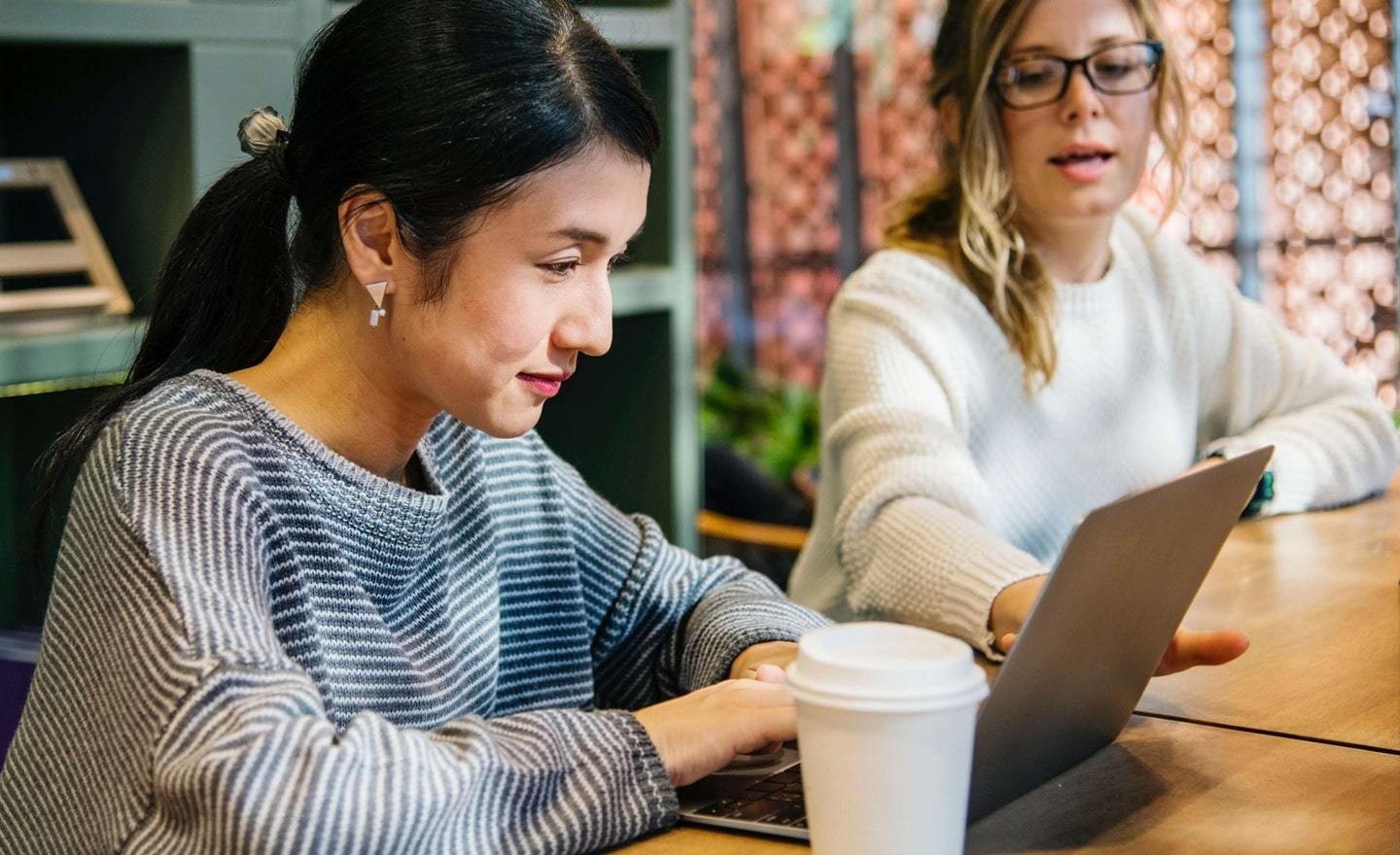 Two female coworkers