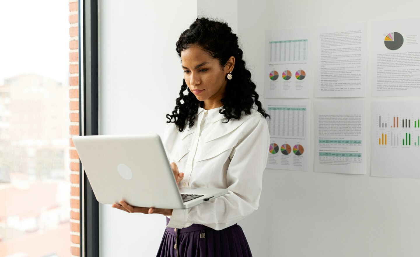 Woman reviewing hiring data