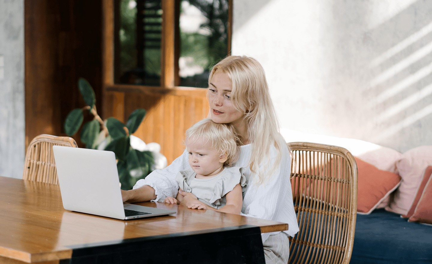 Mom working from home with baby